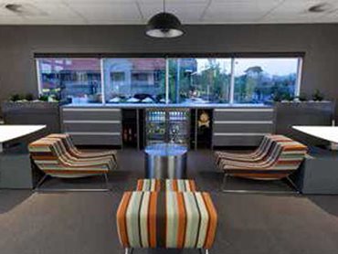 Signature carpet tiles from the Friendly - Wind and Earth collections were selected for the Habitat 1 office flooring.