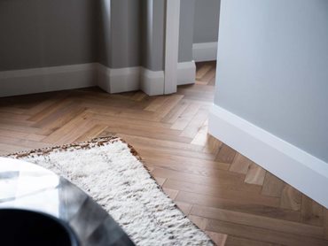 The European Oak parquetry floor was installed in the colour Dozie 
