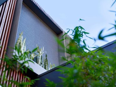Kaynemaile mesh screens fit beautifully with the material selection of the townhouses