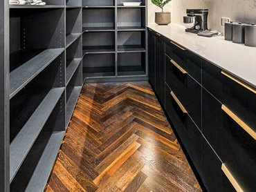 Havwoods Notte herringbone timber flooring makes the home feel warm, welcoming and luxurious 