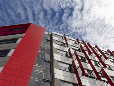 Vibrantly coloured aluminium facade panels were installed on the building