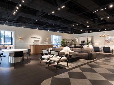 The flooring sets a dark and moody atmosphere throughout the space
