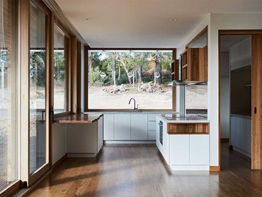 Lift-slide doors and a picture window: the home is designed to provide a strong connection to nature