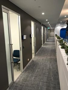 Bris Aluminium cavity sliding door in healthcare interior corridor