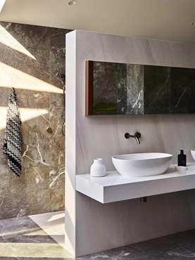 Modern bathroom interior with marble walls and flooring