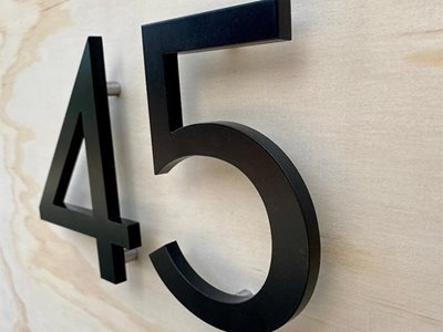 Peninsula House Numbers Ready To Ship On Tile