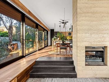 Large glazed windows blur the lines between the indoor and outdoor spaces