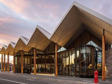 The entrance of the Marrickville Library featuring rounded timber columns