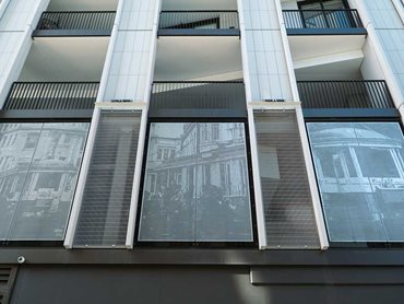 By choosing historic perforated images over standard ventilation screening, Archibald’s architects are bringing Bondi Junction’s past back to life