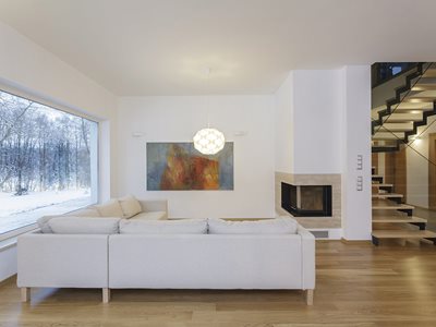 White modern living room interior with insulated glass windows