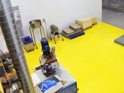 Yellow Flowcrete industrial resin flooring in interior space