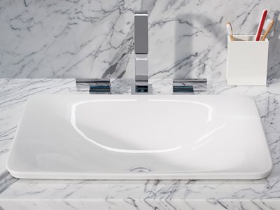 Marble bathroom interior with detailed shot of white Kohler rectangular Carillon basin