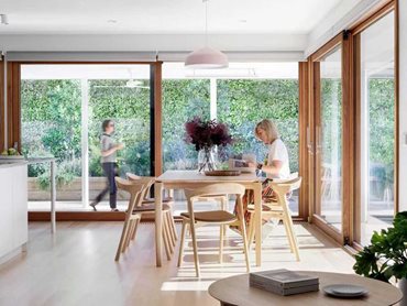 BINQ glazed doors help establish an indoor-outdoor connection at the Belle Project 