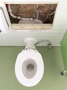 Saniflo Saniaccess Macerator Pump Behind Toilet Bowl