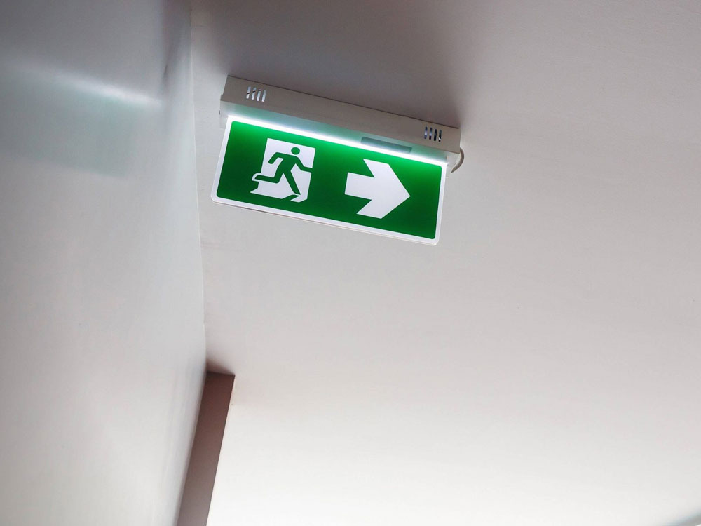 Surface mount emergency exit light