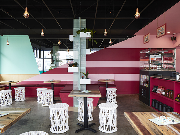 “In addition to the aspirations of our clients, [the design] needed to provide an inviting atmosphere that connected with the Footscray community, would help ensure repeat visits as well as providing for a safe, functional working and baking environment. All of [this] needed to be achieved within a finite budget.”
