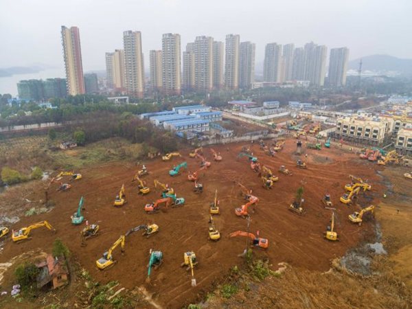 Diggers in China building coronavirus hospital