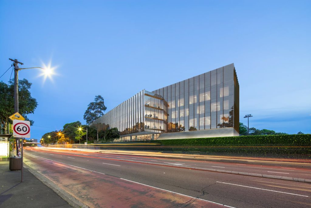 Architectus wrap historic Sydney Uni building with new bronzed glass ...