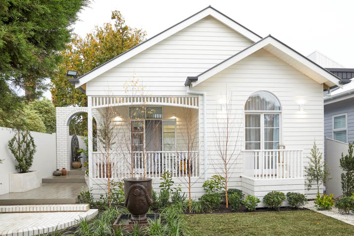 White weatherboard cladding external cottage house home