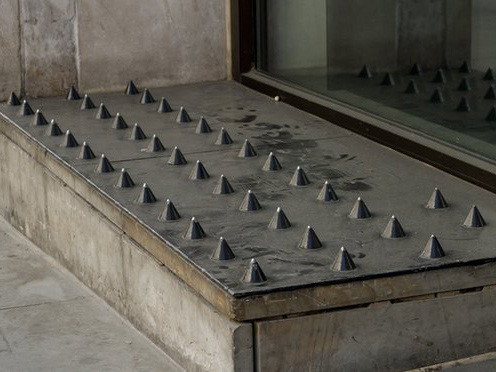 Many cities have used spikes on ledges and other spaces to prevent (usually homeless) people from sleeping or sitting on them. Image:&nbsp;Guy Corbishley/Demotix/Corbis
