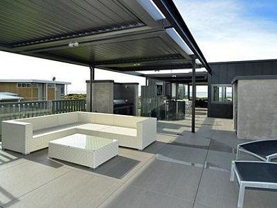 Award winning home featuring 180 Linear Louvretec opening roofs
