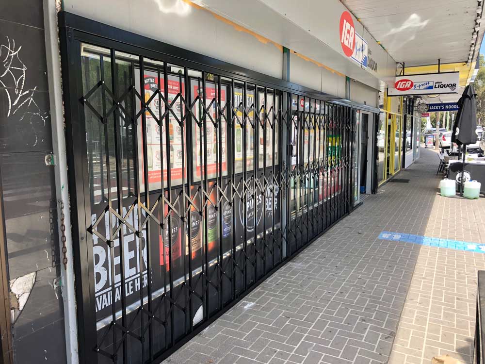 ATDC's S06 expandable security shutters at an IGA store