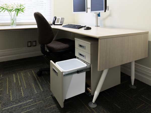 The hidden bins are designed to fit underneath a benchtop or desk