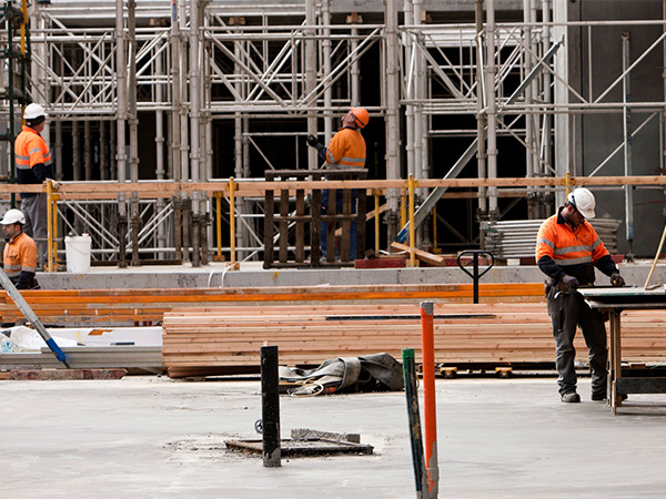 Subcontractors on building site