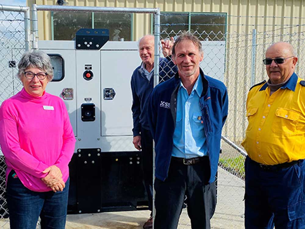 Janet Anderson, Ian Chaffey, John Mansfield and Ian Pratt with the new generator