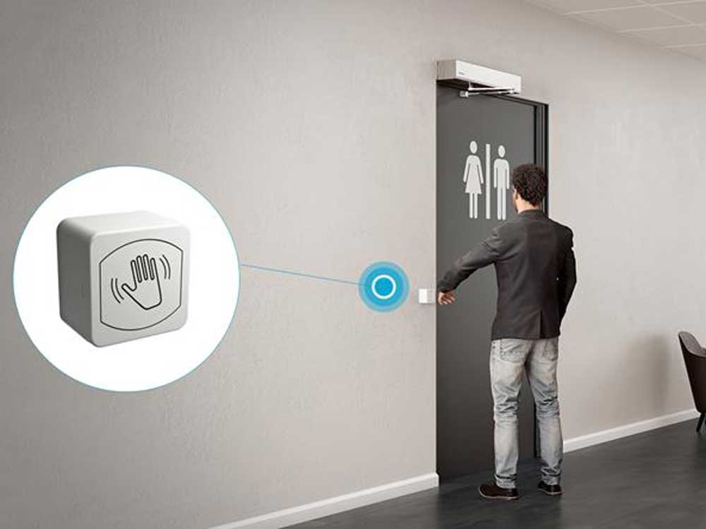 The ASSA ABLOY SA13 activates the automatic door with a touchless wave