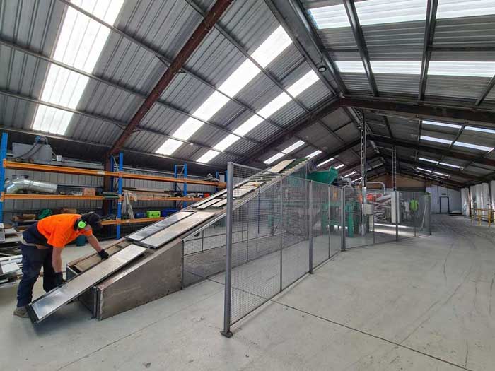 Cladding waste panels enter the process