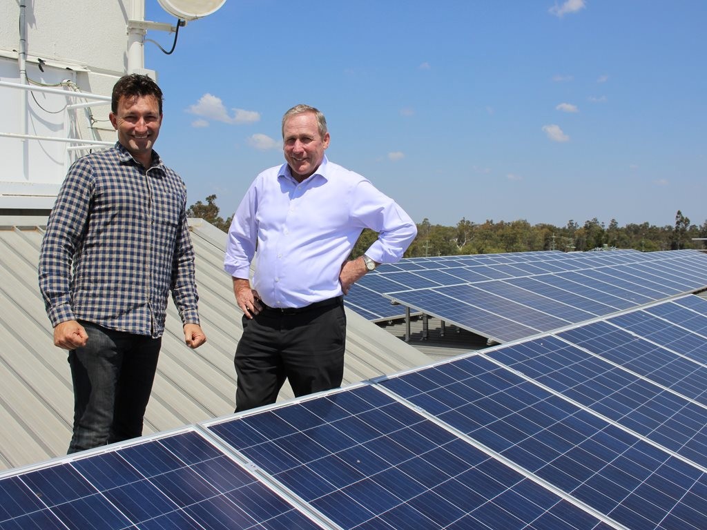 Western Downs Regional Council mayor Paul McVeigh (right) discusses the future of solar on the Western Downs with director of Yellow Solar Matt Buchanan at Council&rsquo;s Marble Street premises in Dalby. Image: Supplied
