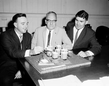 Stephen Trotter, Bert Martin and Everald Compton with the International House Scale Model, 1962. Image: International House