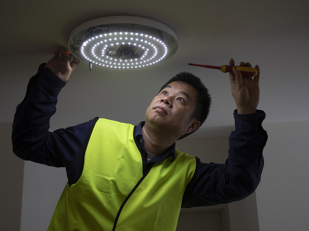 Dr Wen Hu of UNSW at the new residential apartment complex in Castle Hill, testing the EMIoT wireless platform. Image: Quentin Jones/UNSW.
