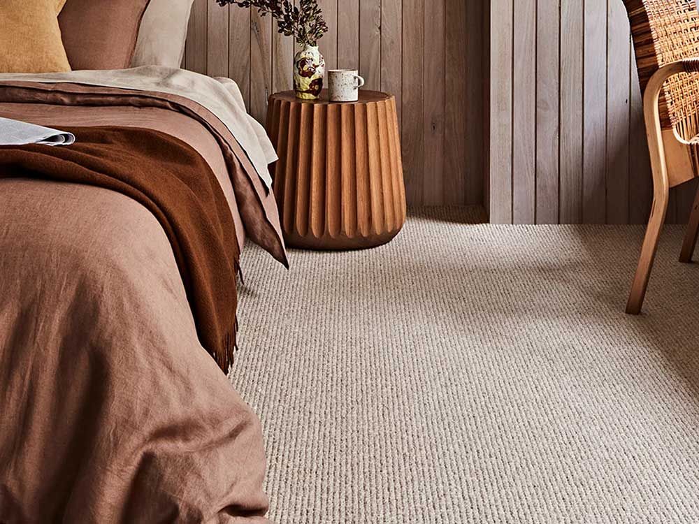 The terracotta bedroom trend inspired us to recreate this colour-blocking with wool and timber 