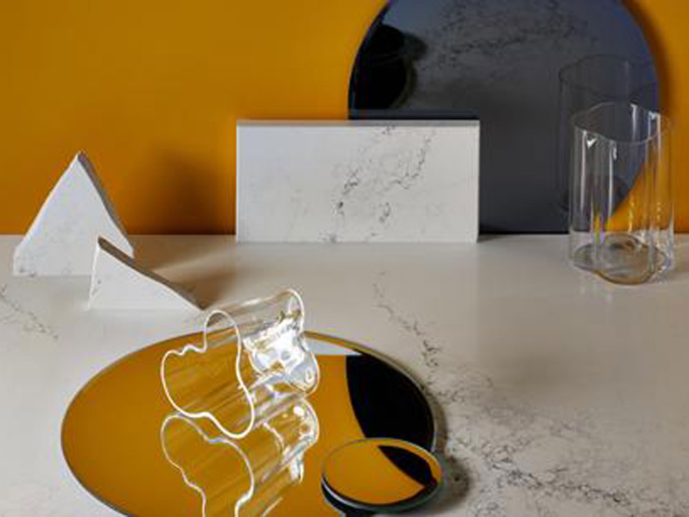 Caesarstone quartz surfaces are paired with Wattyl paint colours