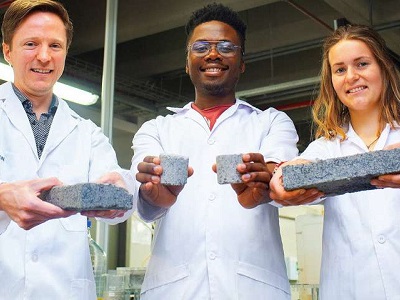 Dr Dyllon Randall and his students, Vukheta Mukhari and Suzanne Lambert. Credit: University of Cape Town.&nbsp;Image: The world&rsquo;s first bio-brick made using human urine was unveiled at UCT this week. In the picture are (from left) the Department of Civil Engineering&rsquo;s Dr Dyllon Randall and his students, Vukheta Mukhari and Suzanne Lambert. Credit: University of Cape Town
