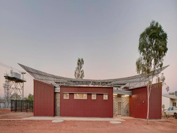Red health clinic in desert