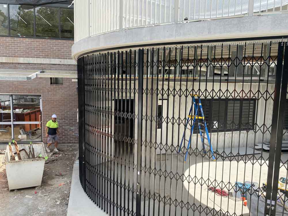 ATDC's S08 curved retractable steel security screen 