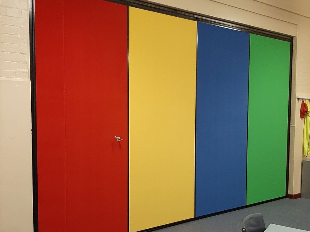 The multi-coloured custom folding door at Glebe Public School