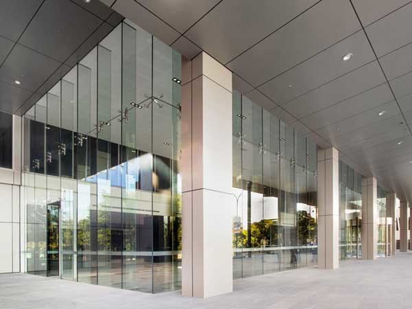 Custom laminated 7m fins from Cooling Bros achieve striking glass design at Perth office building | Architecture & Design