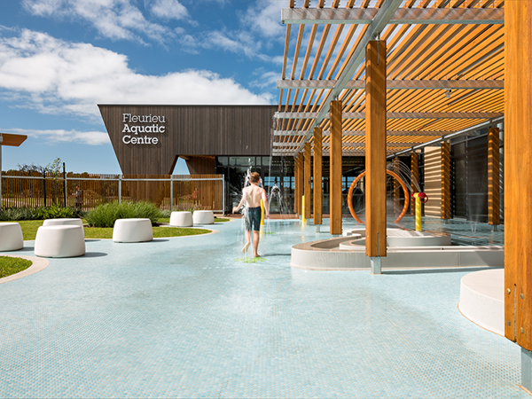 The concept for Fleurieu Aquatic Centre is inspired by the local indigenous story of Kondili the whale. In this story, four friends are attacked and retreat to the sea to become four sea creatures. This is manifested in the pool by way of four key spaces (pool hall, warm water pool, community facilities / multipurpose and administration/services spine) representing each of the creatures.