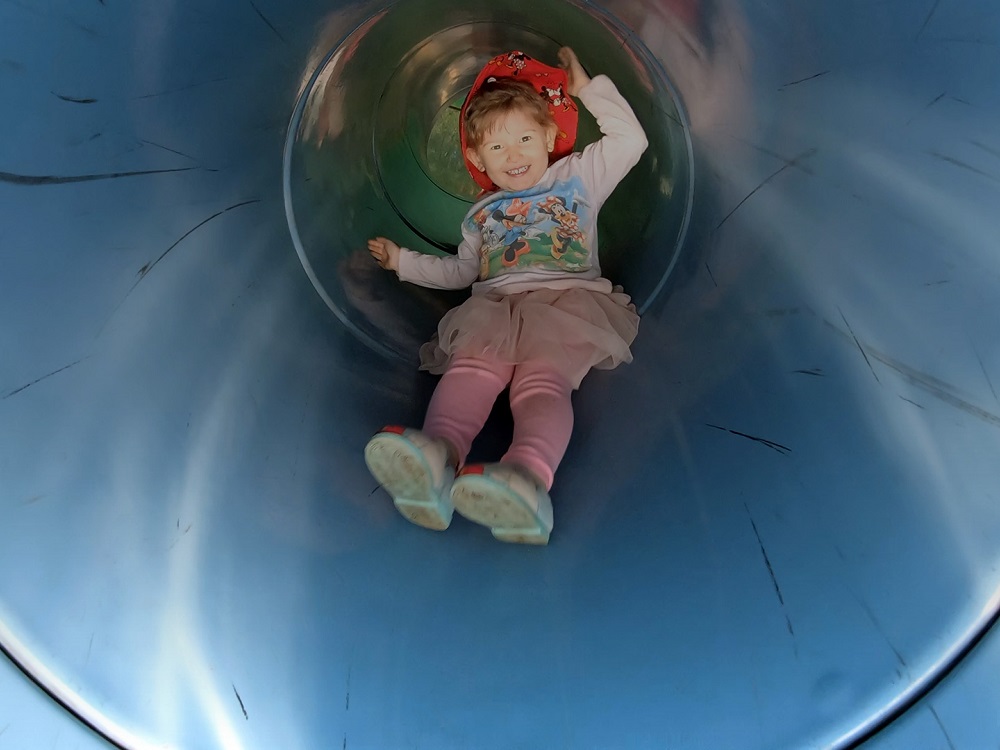 Kid on slide