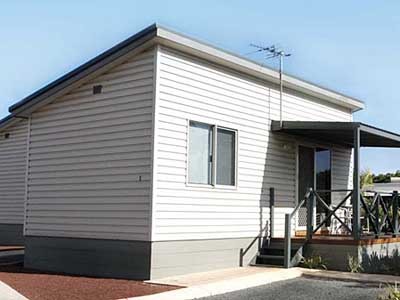 Vinyl cladding is a popular and economical choice for granny flat exteriors