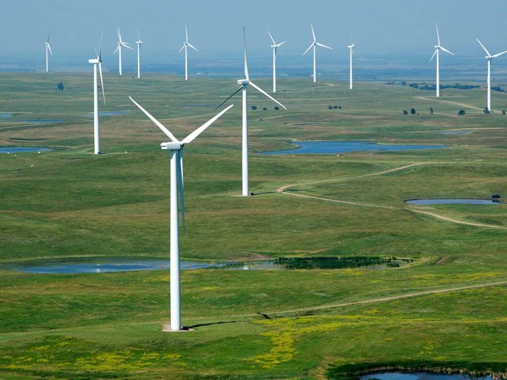 John Holland is the first company in the construction industry to join the Qantas Future Planet program - offsetting carbon emissions from all flights taken by the business. Image: Crow Lake Wind Farm

