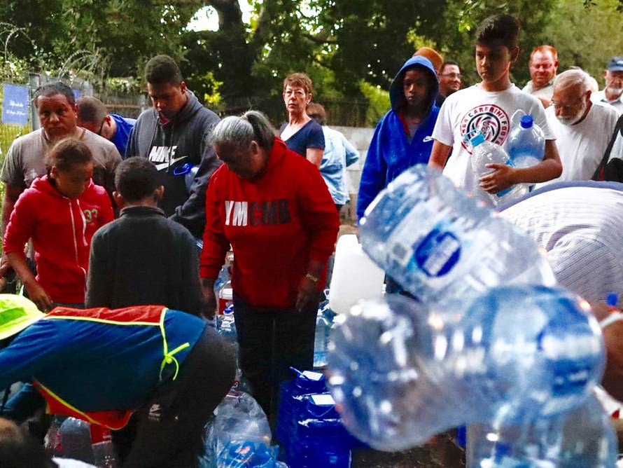 Cape Town&#39;s residents will soon need to queue up daily for water rations. Photography by Nic Bothma/EPA
